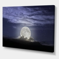 Puni mjesec koji se diže u oblačnom noćnom nebu slikati platno umjetnički tisak